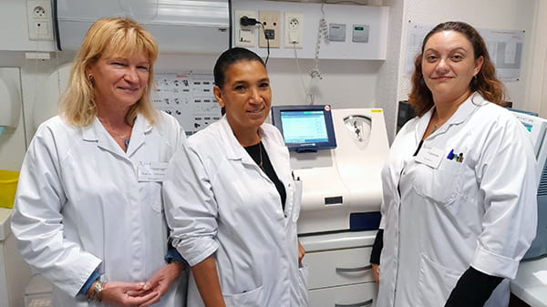 The team from the Lambert Clinic in France with the AQT90 FLEX immunoassay analyzer